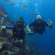 Two divers pose for the camera.