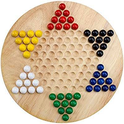 a Chinese checkers board, showing a 6 sided star with marbles of different colors arranged in each star point