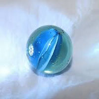 a clear marble with a blue filling