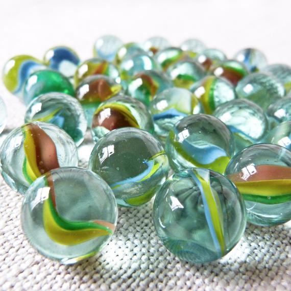 a bunch of marbles close to the camera