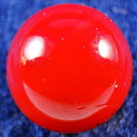A solid red marble that looks like the happy fun ball from that one SNL skit