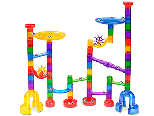 A simplistic plastic marble tower made of many different colors and funnels