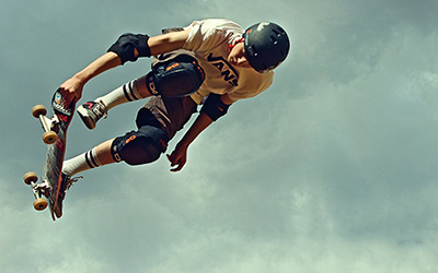 A Skateboarding catching some sick air