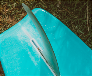 a teal surfboard